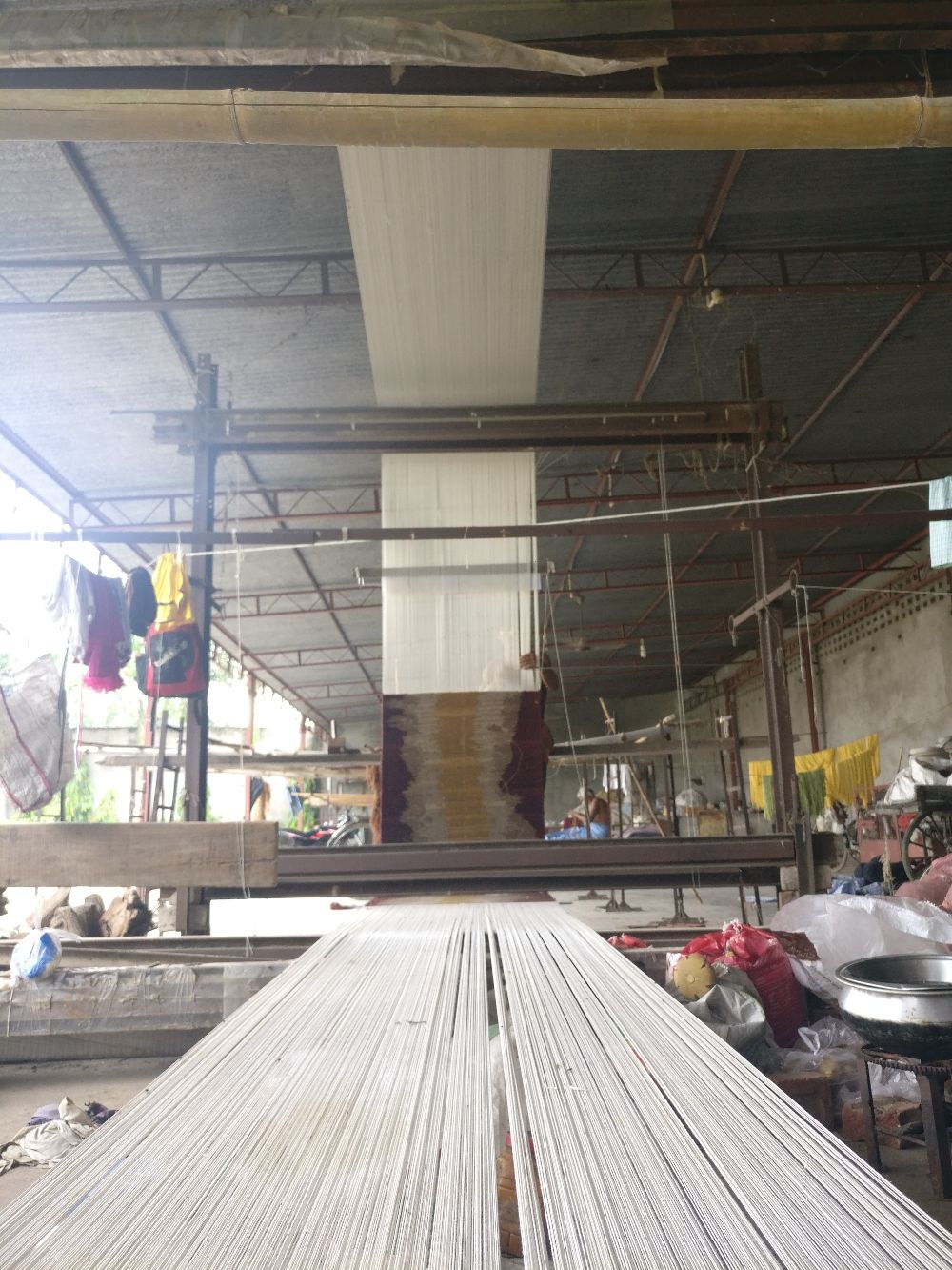 Rug being woven on the loom